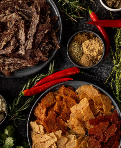 Clean kosher meat and plant-based snacks - Primal Krisp banner with bold ingredients